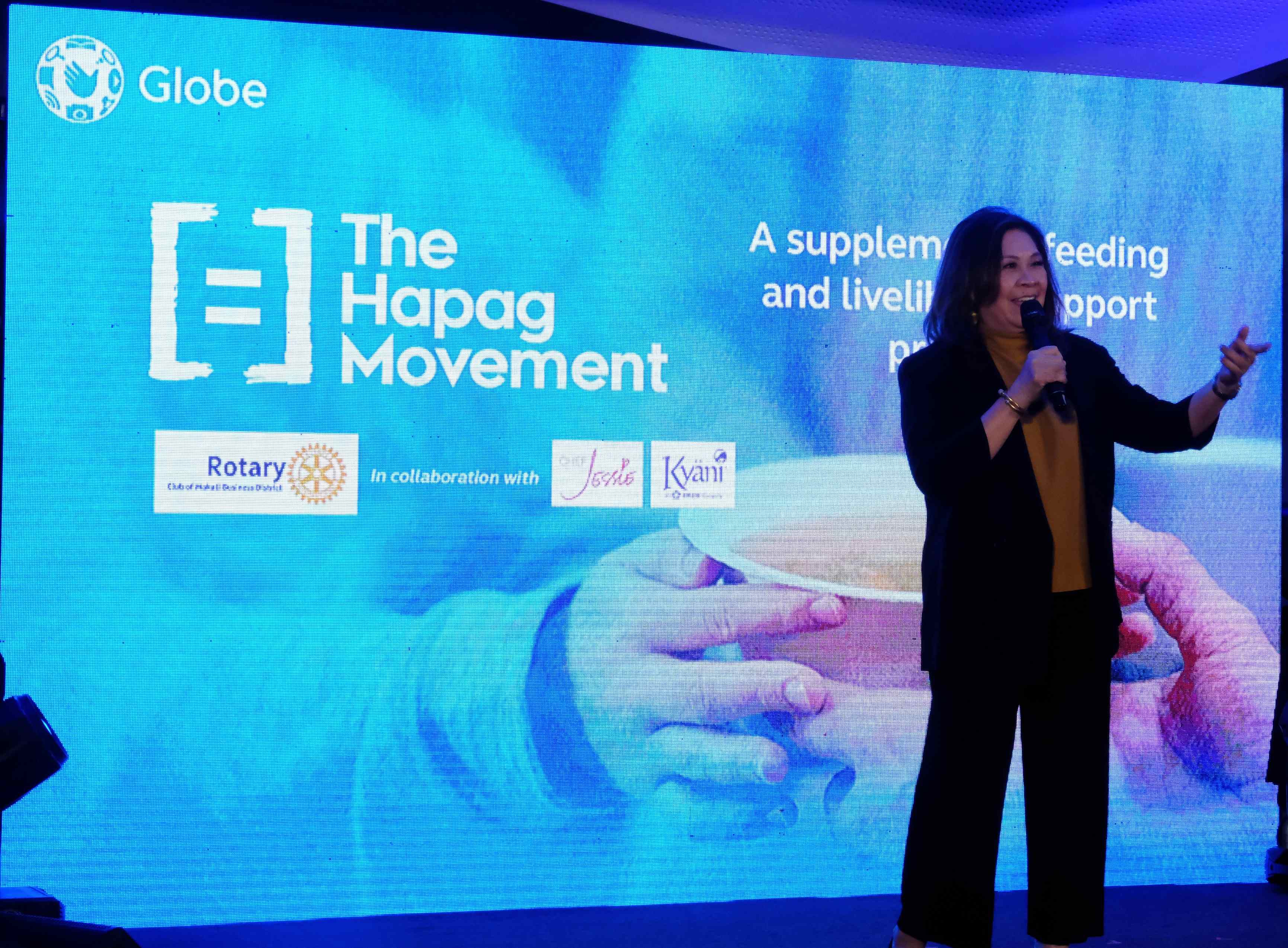 Kate Bellosillo speaks on stage at The Hapag Movement event, a Globe and Kyani Philippines partnership.