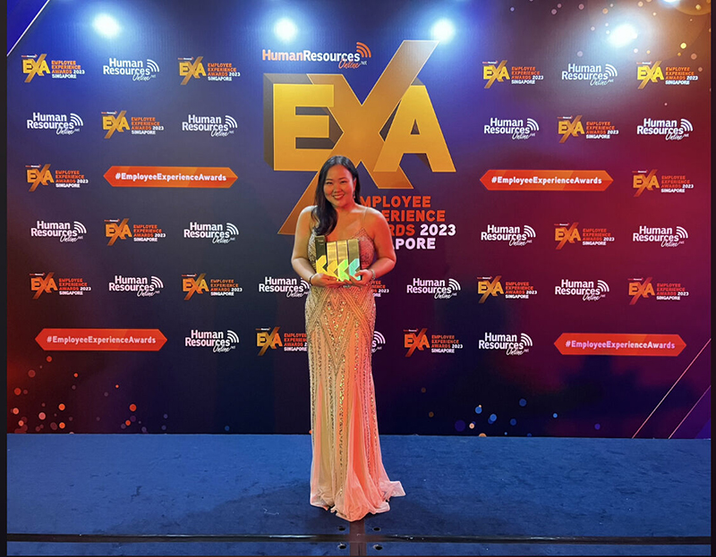 Nico Bambao receives Globeâs four trophies at the HR Online Employee Experience Awards in Singapore