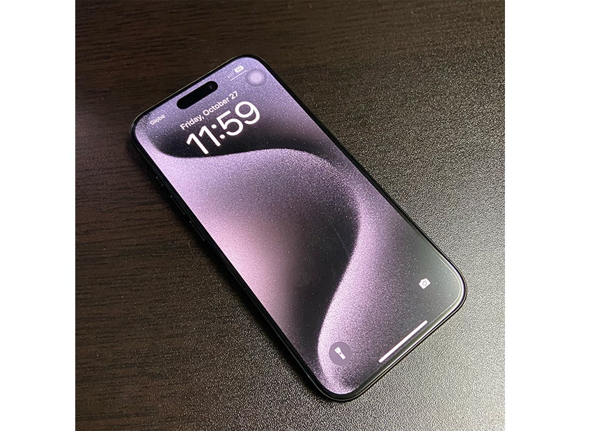 Photo of iPhone 15 Pro on a table.