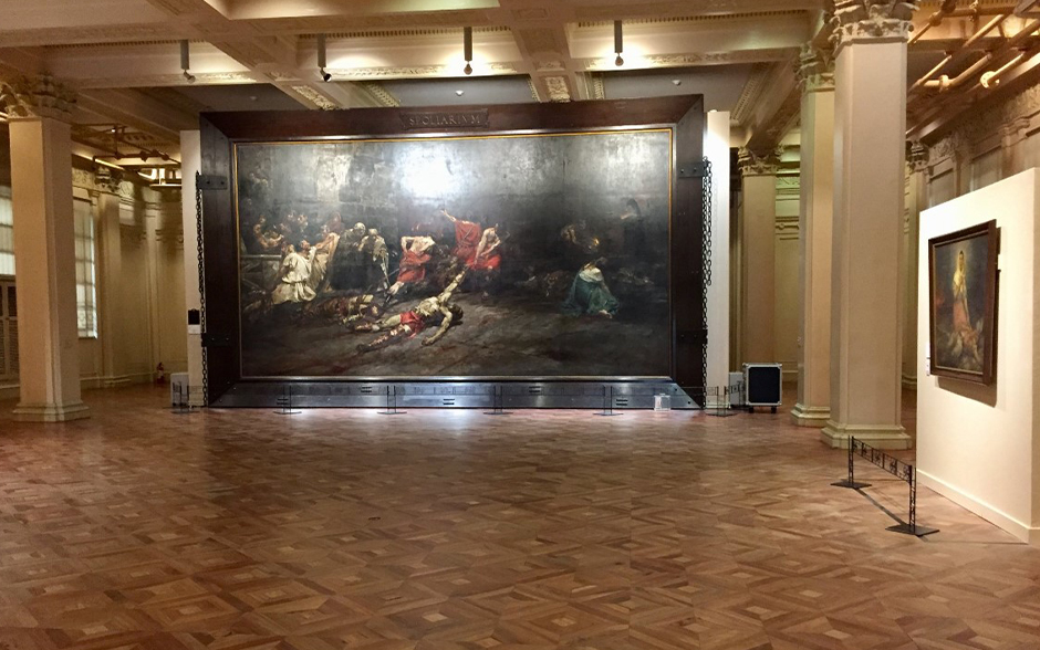 A photo of Juan Lunaâs Spoliarum in the National Museum of Fine Arts.