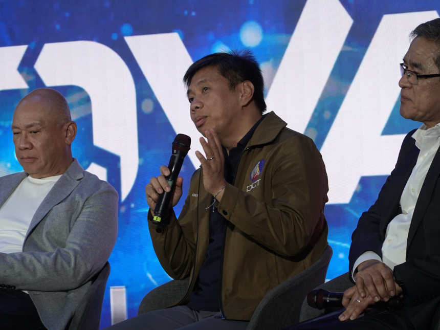 DICT Secretary Henry Aguda speaks during INNOVANIA 2025.