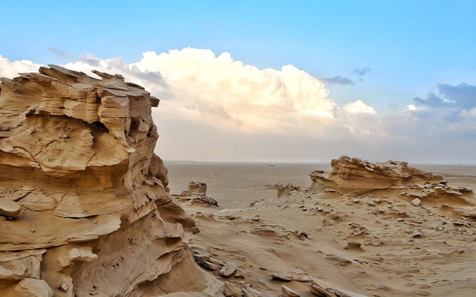 Photo of a rocky, sandy landscape in Saudi Arabia.
