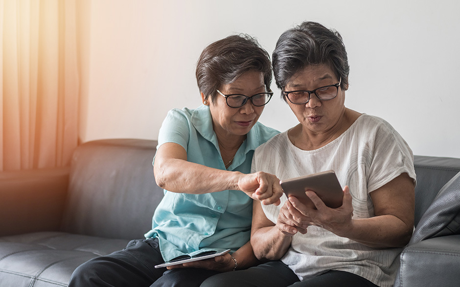 Women who enjoy using their smartphone and digital tablet together