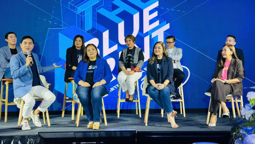 Globe executives on stage at âThe Blueprintâ launch event, discussing the companyâs inclusive innovations.