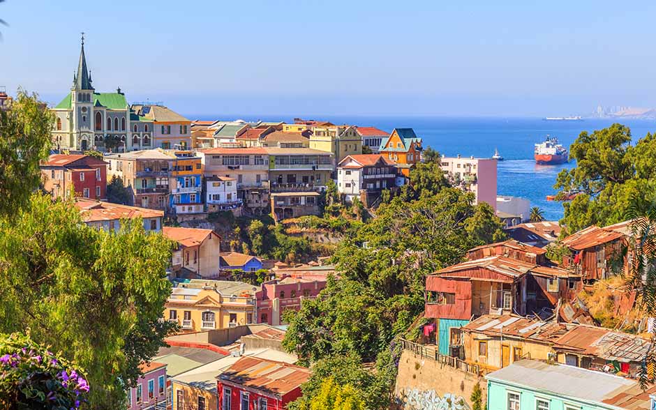 Colorful hillside houses in Valparaiso overlooking the sea
