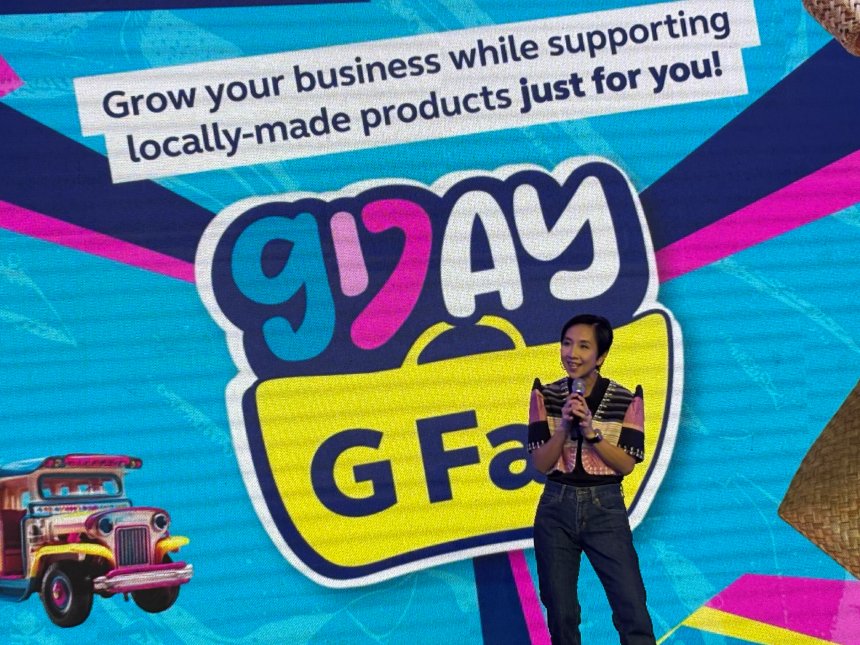 Head of Globe Business KD Dizon speaking at G Fair 2025.