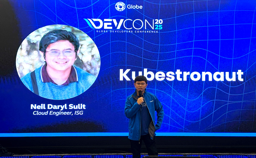 Globe's Cloud Engineer, Neil Daryl Sulit speaking at DevCon 2025.