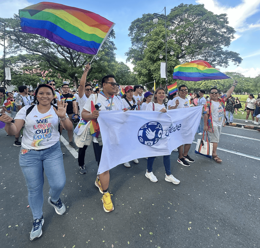 Globe employees at the 2025 Pride PH march at UP Diliman.