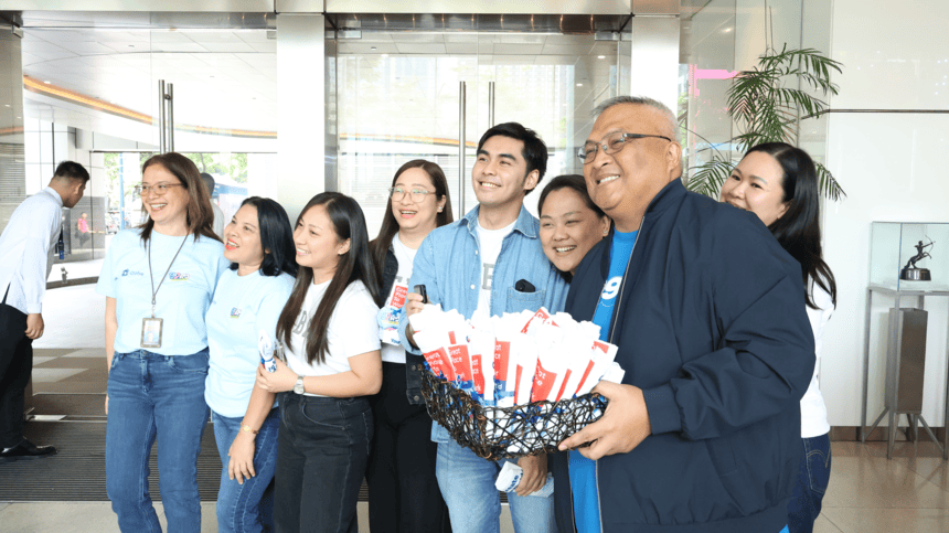 Globe President and CEO Carl Cruz with Globe employees.