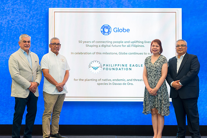 Leaders from Globe and the Philippine Eagle Foundation commemorate a partnership during Globe's 50th year as a publicly listed company celebration.