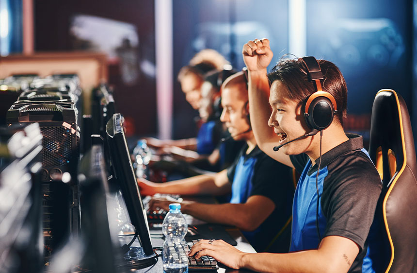 Gamers compete together during an esports match.