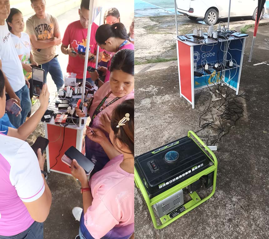 People at the Libreng Tawag, Libreng Charging, and Libreng WiFi station.