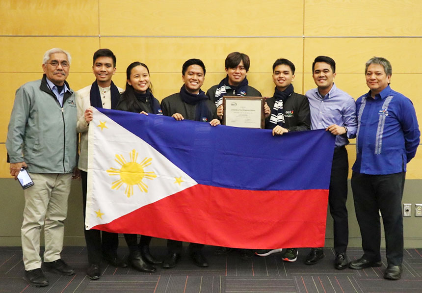 University of the Philippines students proudly holding the Philippine flag.