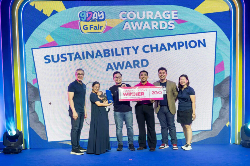 Nesza and Rich Asuncion of Lumi Candles PH receiving the Sustainability Champion Award.