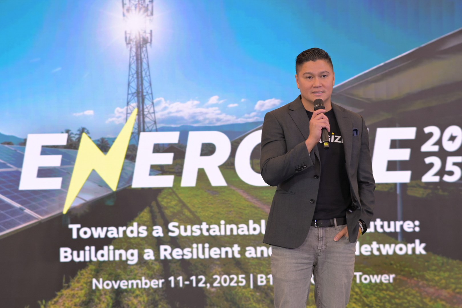 Globe CFO Carlo Puno speaks at the Energize 2025 Summit.