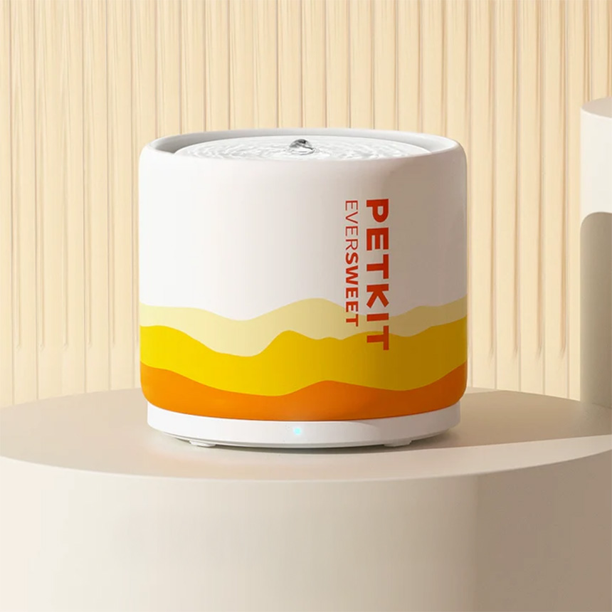 PETKIT Ceramic 2 wireless pet water fountain with a modern ceramic design on a minimalist table.
