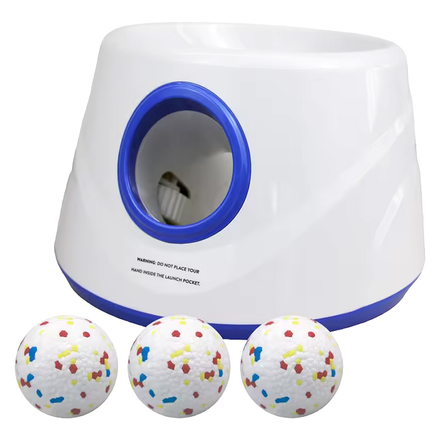 Automatic interactive dog ball launcher with three tennis balls on a white background.