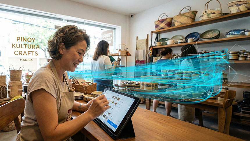 A woman using a tablet at Pinoy Kultura Crafts store.