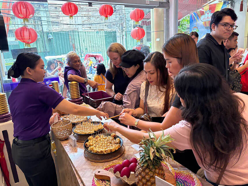 Diners choosing their meals at the busy service counter.