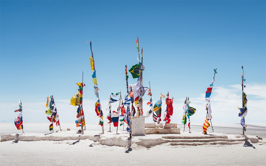 International flags at Uyuni Salt Flats, Bolivia.
