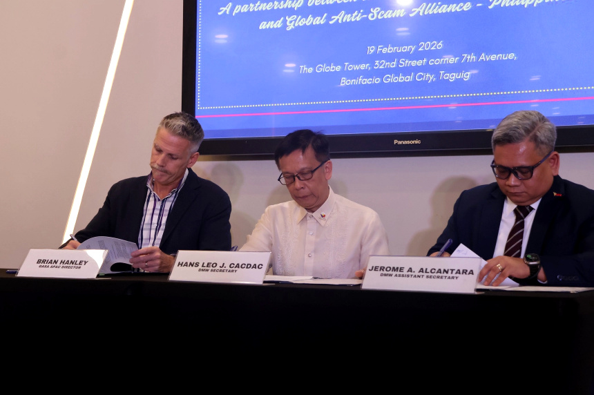 Brian Hanley, GASA APAC Director; Hans Leo J. Cacdac, DMW Secretary; and Jerome A. Alcantara, DMW Assistant Secretary, signing the Memorandum of Understanding.
