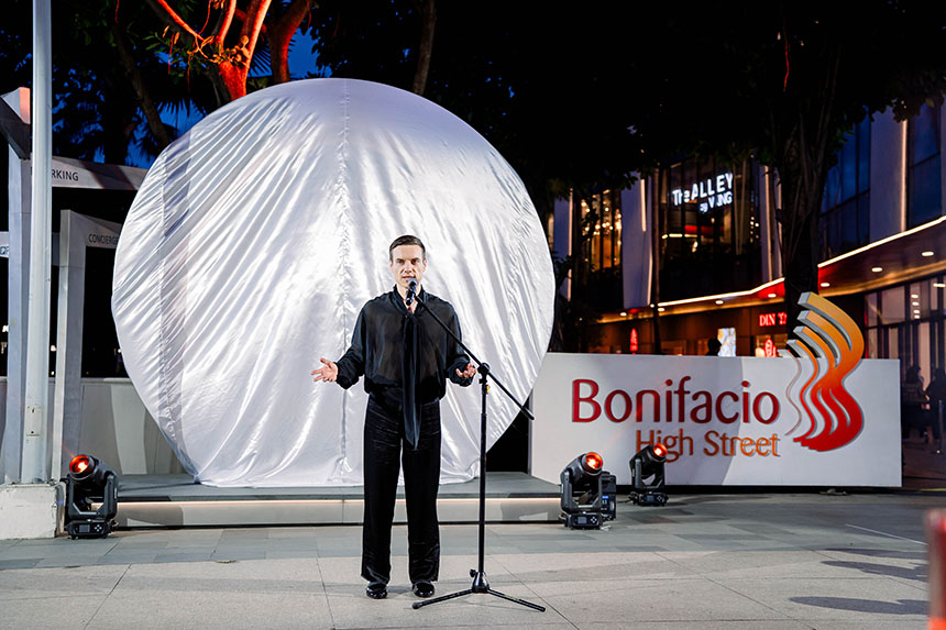Benediktas Gylys, founder of the Portals project, speaks during the launch of the Portal installation at Bonifacio High Street.