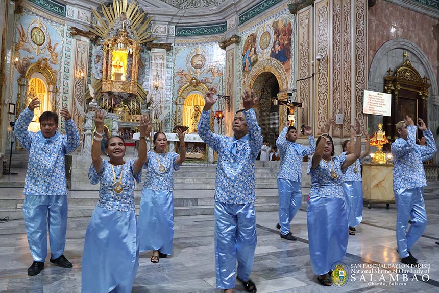 Devotees performing Sayaw sa Obando dance inside a church during the Obando Fertility Festival.