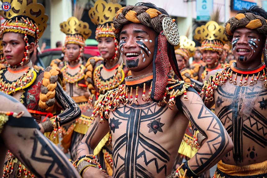 Pintados Festival performers with body paint and traditional costumes in Tacloban.