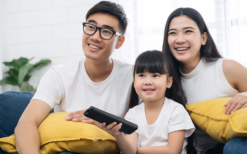 Asian family streaming shows on TV as part of their internet package.