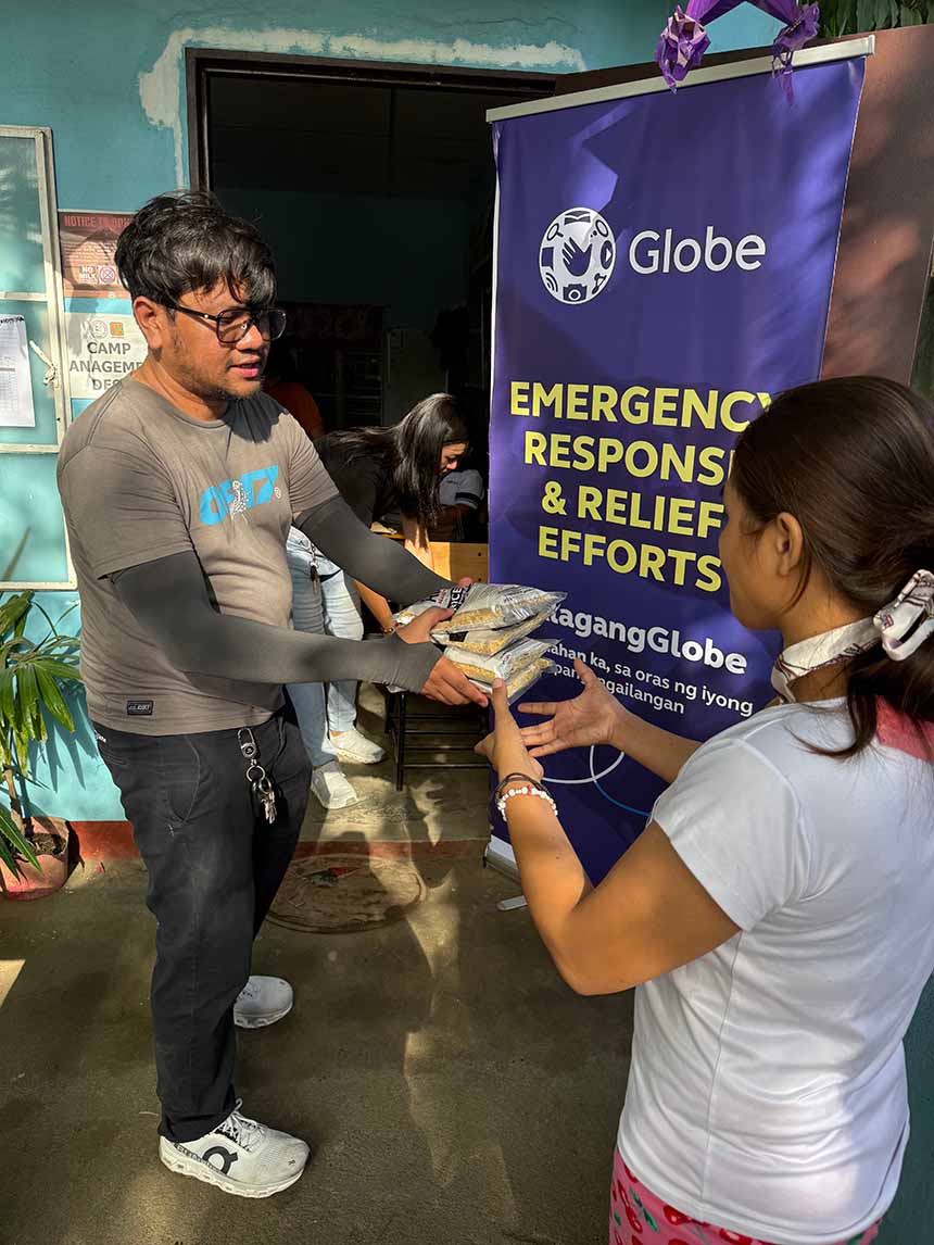 Globe distributing relief packs in Albay.