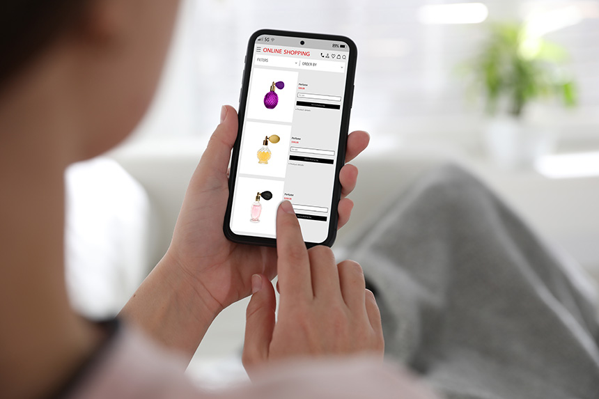 Person shopping online for everyday essentials from home.