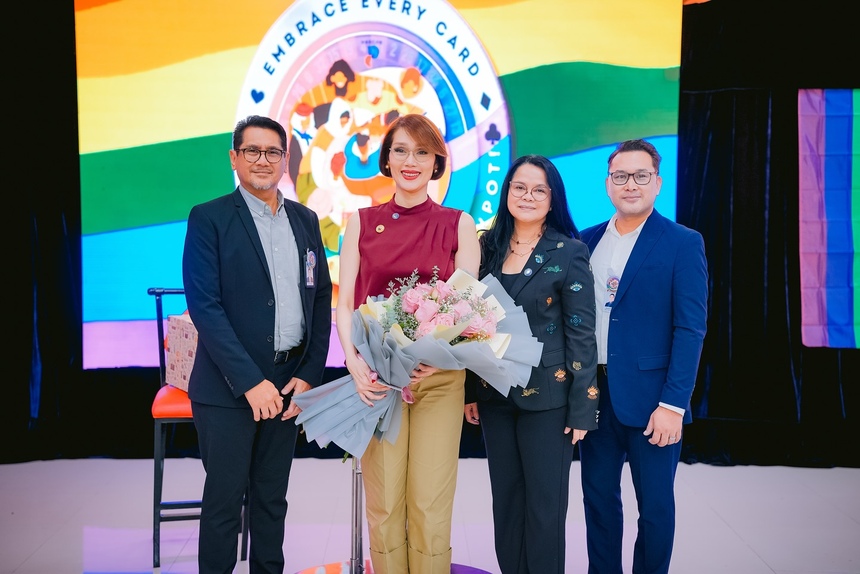  Former Representative Geraldine Roman poses with organizers during a Pride Month celebration hosted by PAGCOR.