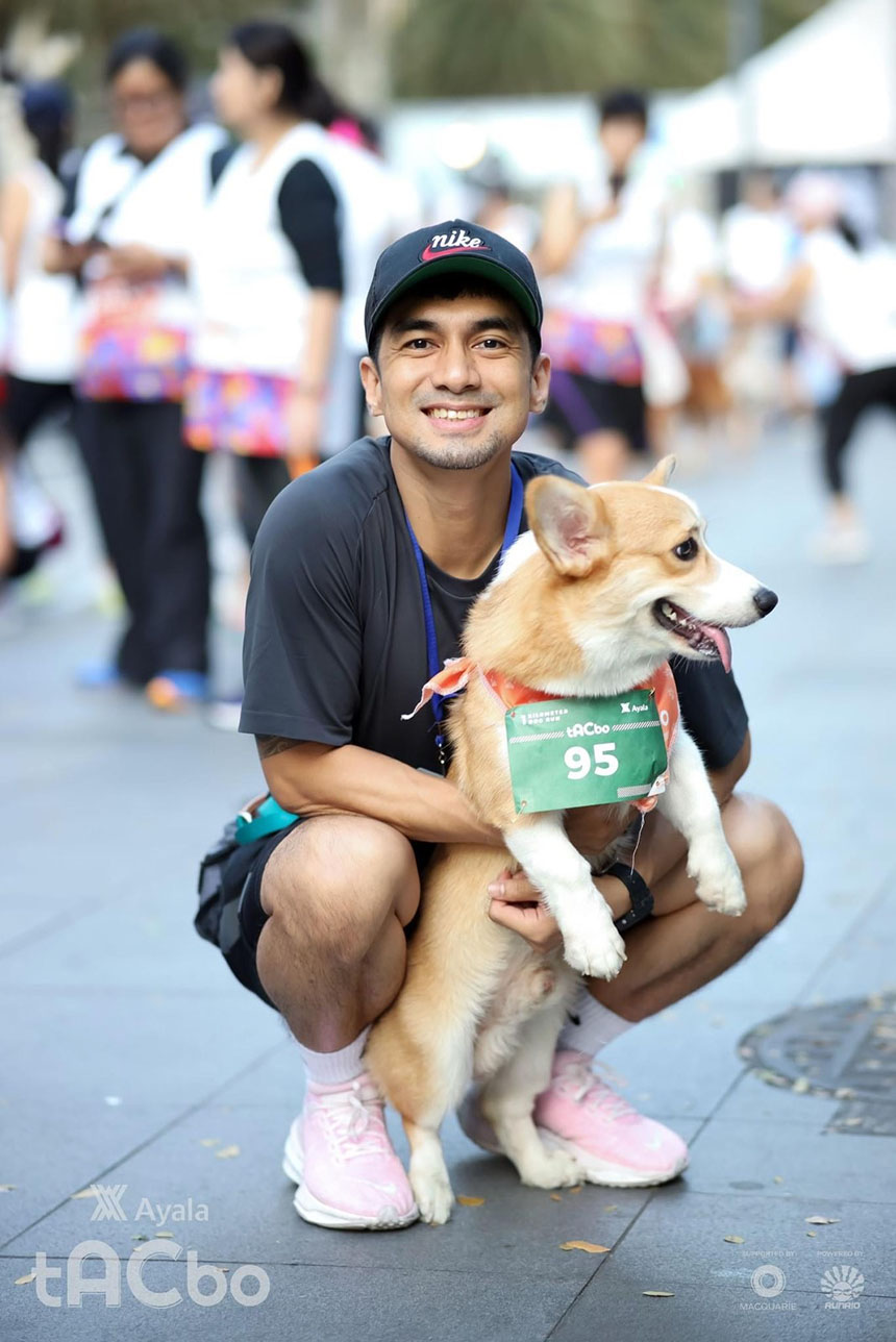 Johann with his Pembroke Welsh Corgi, Bean, during a pet-friendly fun run.