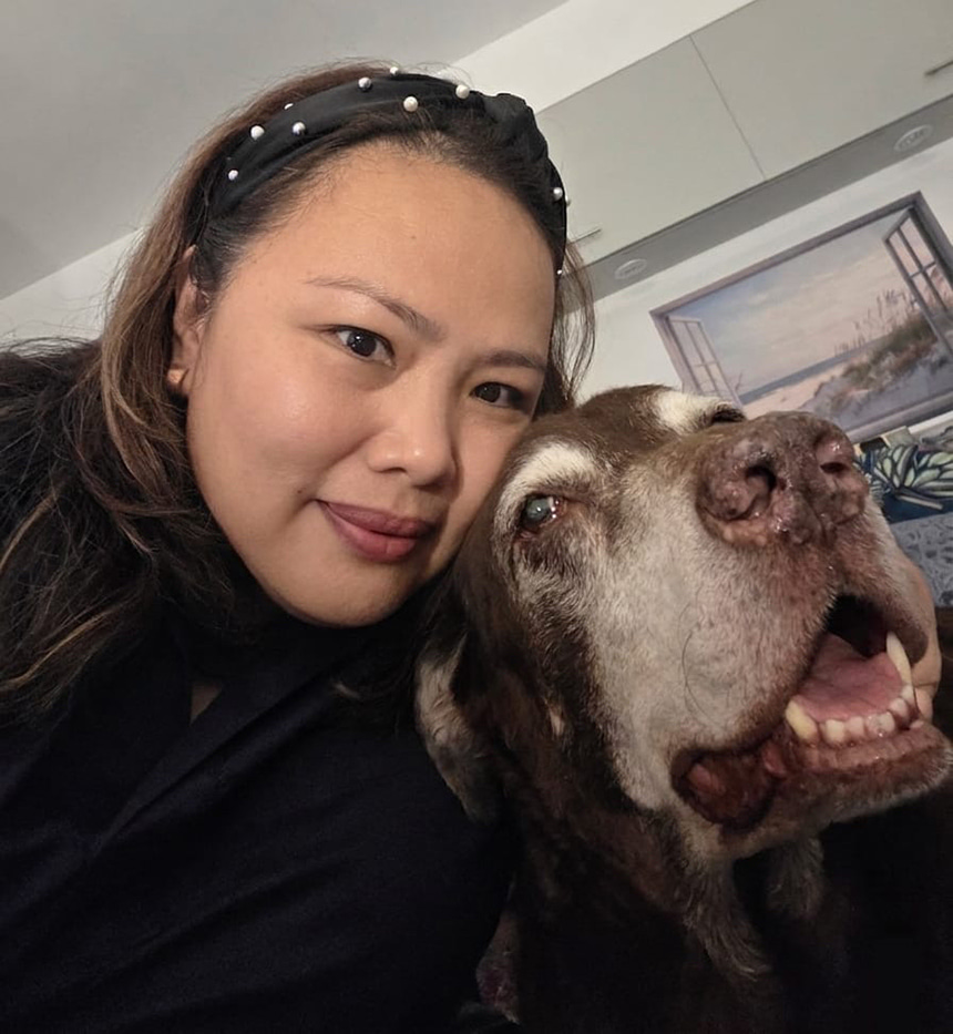Roche Vandenberghe with her chocolate Labrador, Charlie.