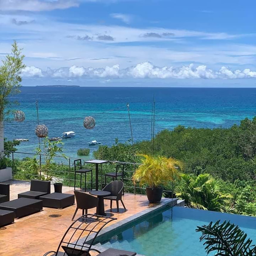 View of Bohol Sea from the pool area of Ocean Suites Boutique Hotel.