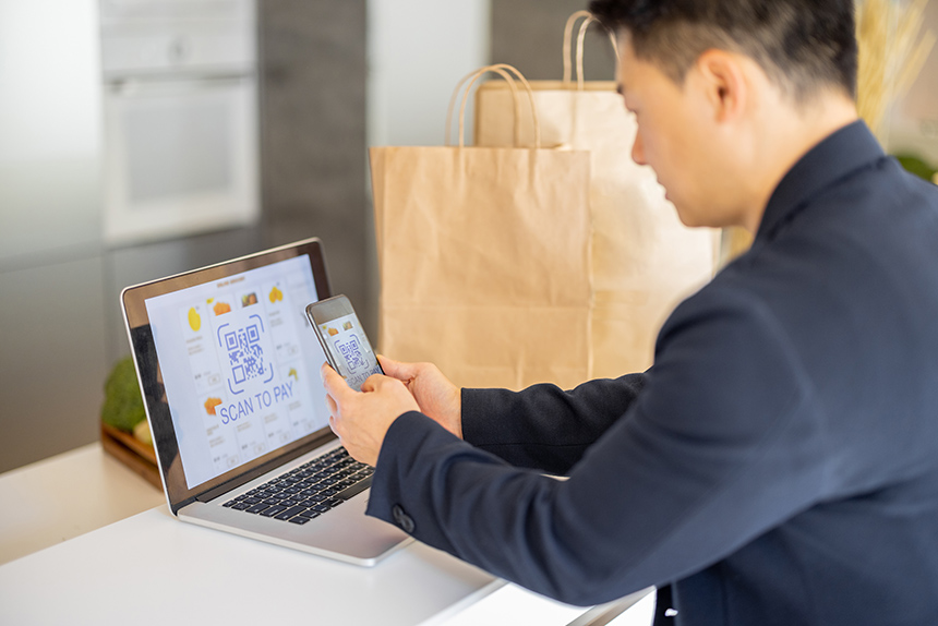 Person comparing grocery deals on a smartphone.