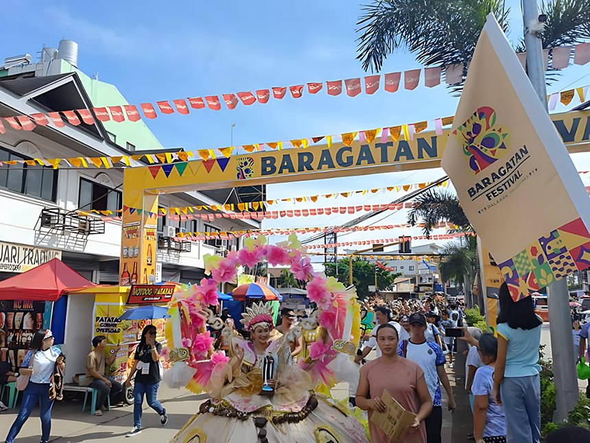 Festival celebrations under the main welcome arch at the Baragatan sa Palawan 2026.