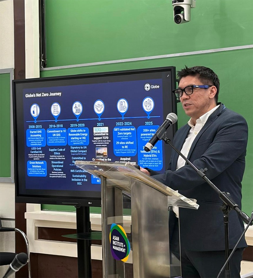 Globe VP Raymond Aguilar delivering a speech on Globe's Net Zero Journey at the Asian Institute of Management (AIM)
