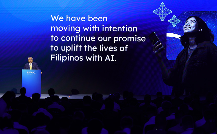 Globe CEO Carl Cruz on the MWC GSMA stage presenting the company's intentional promise to uplift Filipino lives with AI.