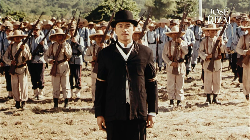 Scene from the 1998 José Rizal film showing Rizal standing before Filipino revolutionaries.