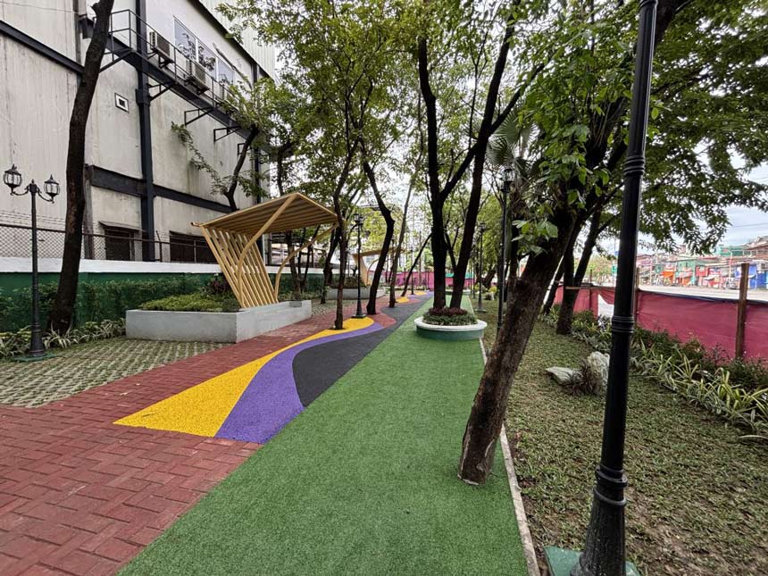 Colorful landscaped walkway at the Navotas Green Zone Park.