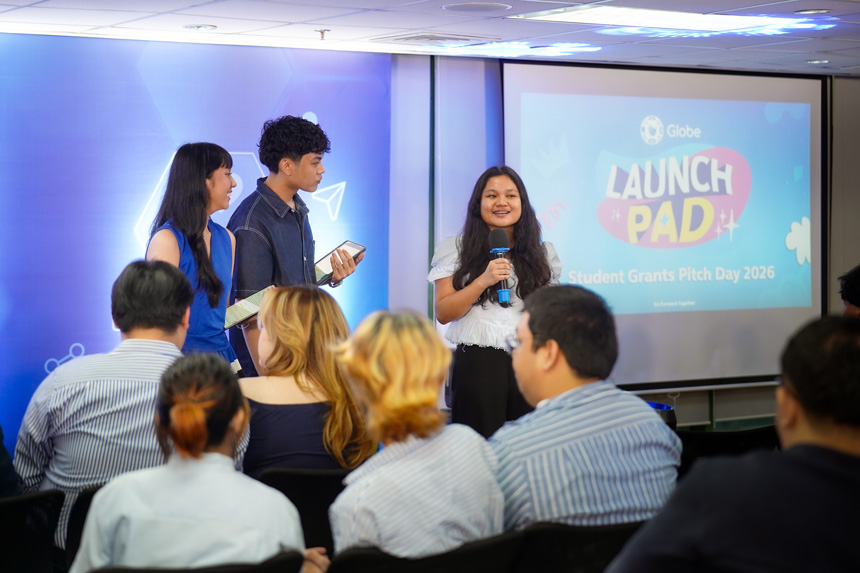 Student innovators presenting their ideas on stage to Globe leaders during the Globe Launchpad 2026 Student Grants Pitch Day.