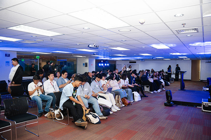 Student innovators sitting together at the Globe Launchpad 2026 event space.
