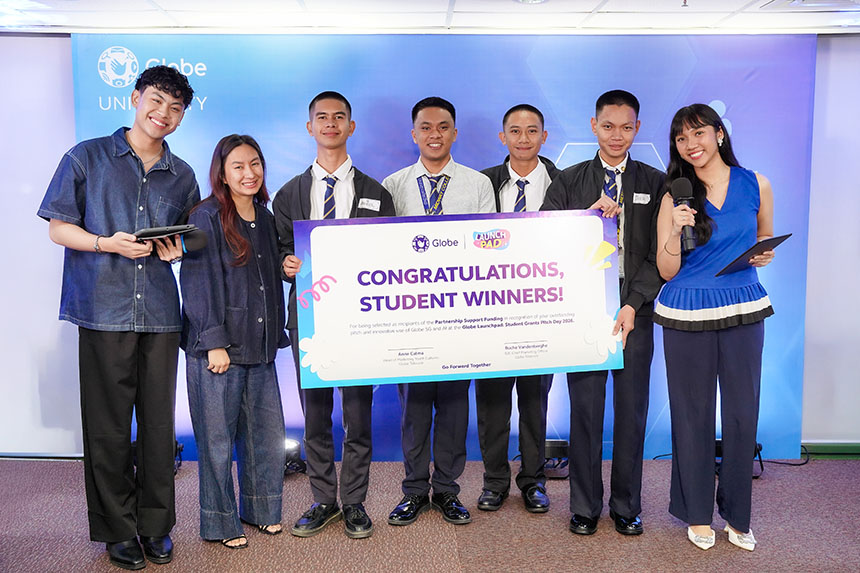 Student winners holding a congratulations board at Globe Launchpad 2026.