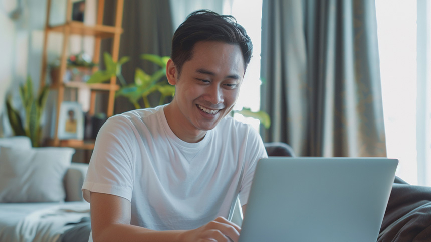 A man uses his laptop to get his virtual identification card.