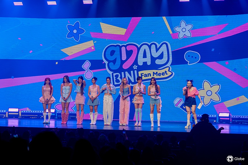 GDay 2025 BINI Fan Meet with BINI members performing on stage.