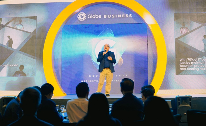 Glenn Estrella speaks on stage at the Globe Business G Summit 2026.