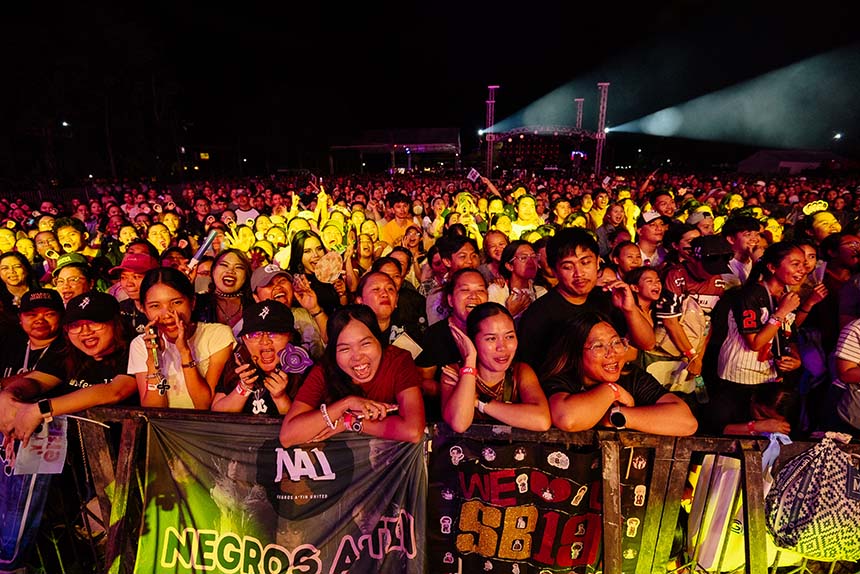 A large crowd of enthusiastic fans attending the SB19 concert at TM's 25th Anniversary TeaM Fair in Bais City, Negros Oriental.